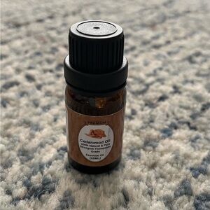 Premium Cedarwood essential oil, 10 mL - half full